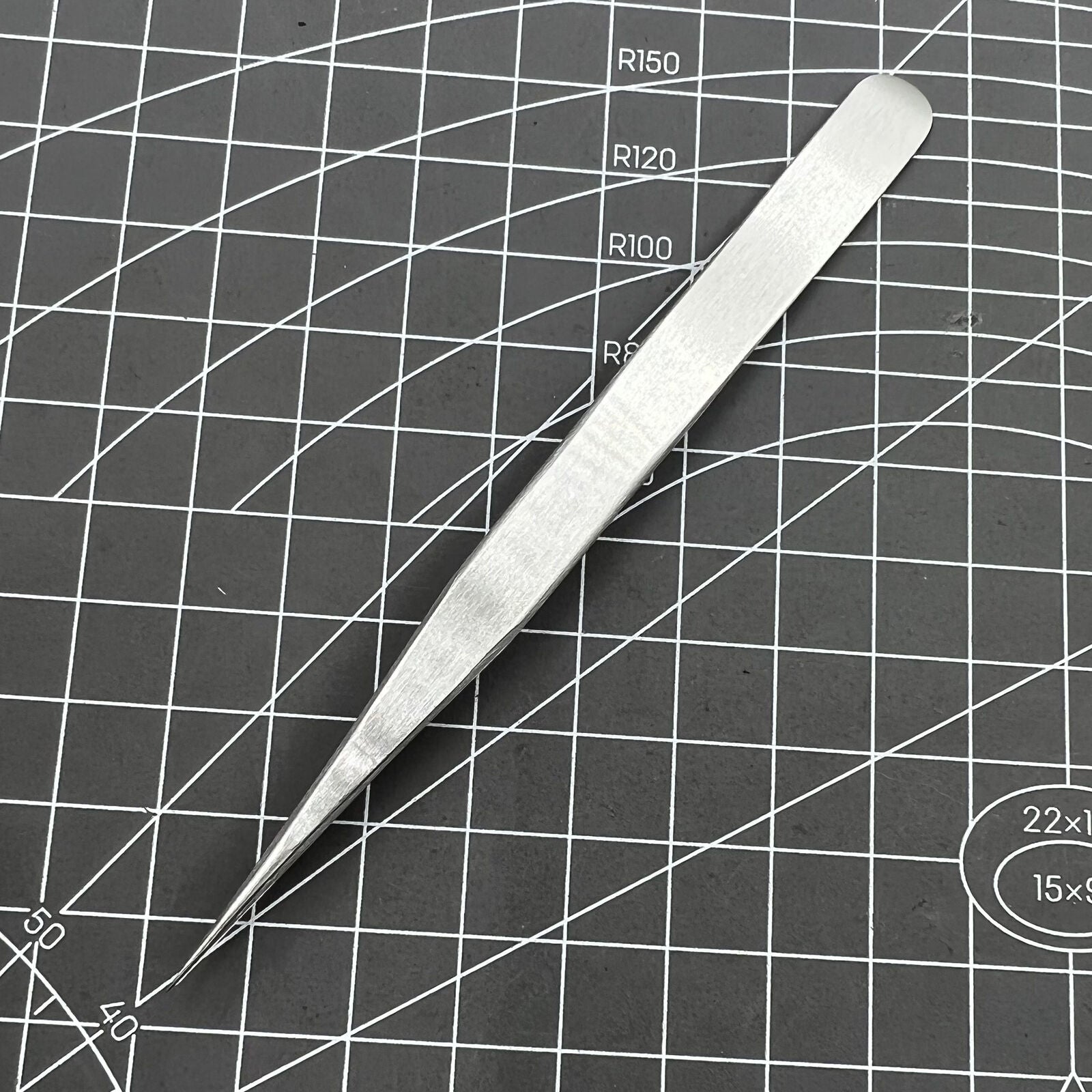 Swiss Horotec MSA12.302-3 antimagnetic fine tweezers for precise hairspring handling and watch repairs.