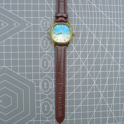 Shanghai 33mm manual mechanical watch with blue dial, gold markers, square case, 17 jewels movement for classic style.