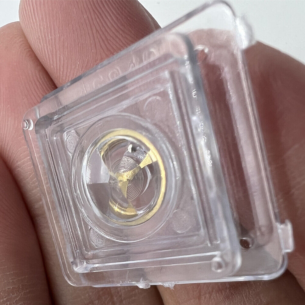 Golden complete balance wheel with hairspring for Orient 46941 46943 movement, precision watch accessory.