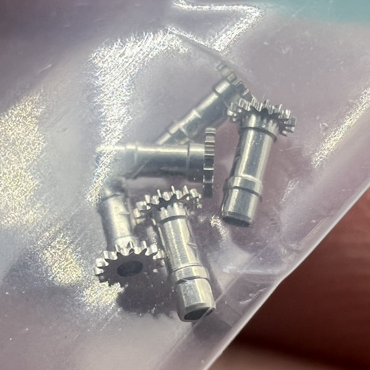 Cannon pinion with driving wheel for NH35 NH36 watch movement, precision fit for smooth timekeeping.