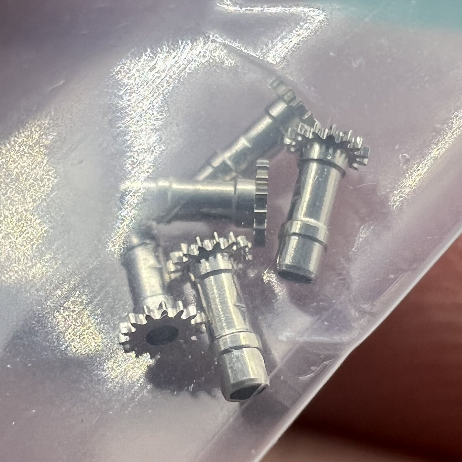 Cannon pinion with driving wheel for NH35 NH36 watch movement, precision fit for smooth timekeeping.