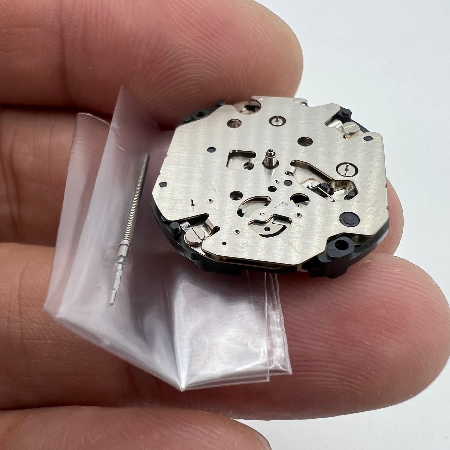 Hattori Epson VX3T quartz watch movement, precision Japanese craftsmanship for reliable timekeeping.