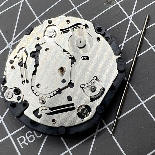 Japan Made Hattori Epson TMI VX9N VX9NE quartz watch movement for precise timekeeping and durability.