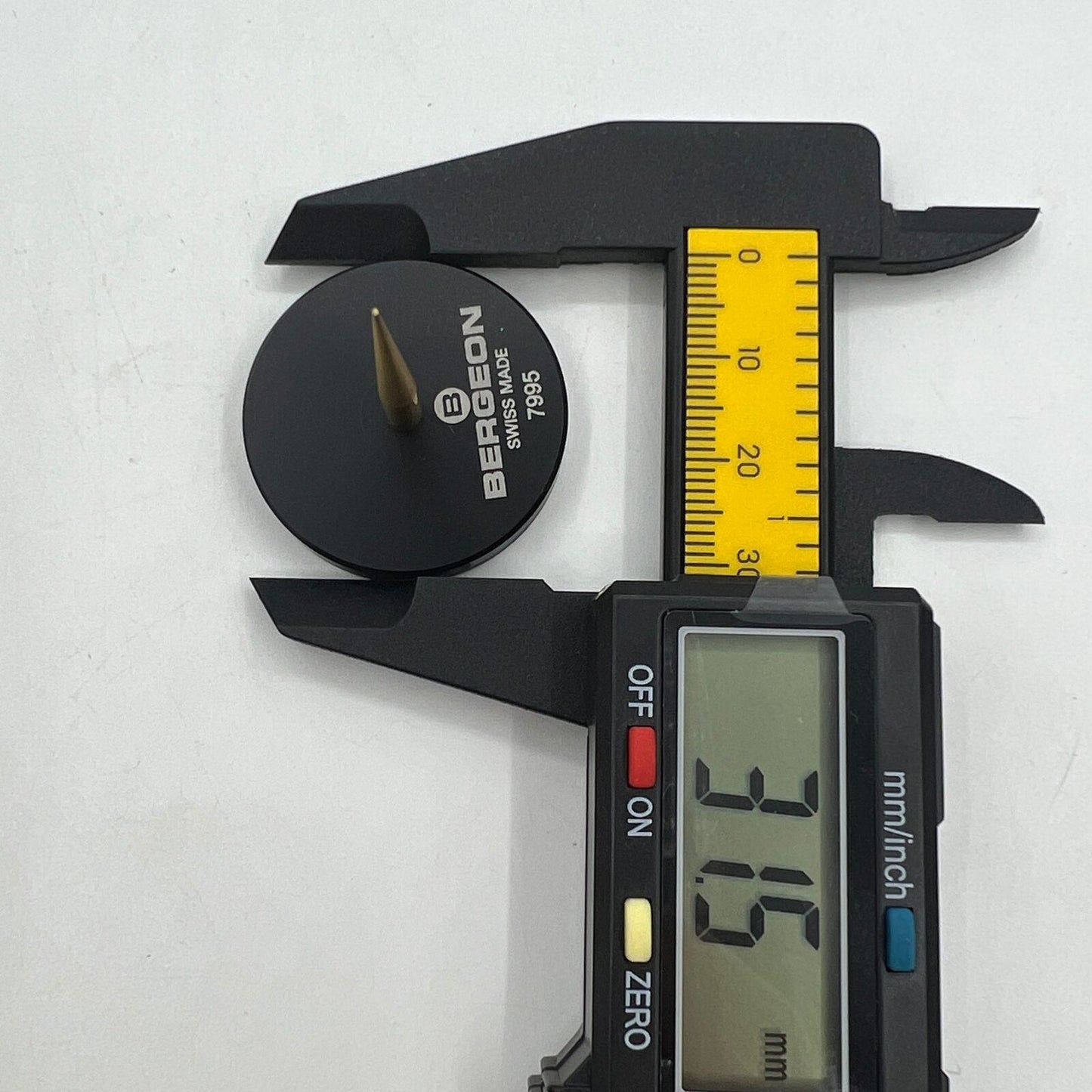 Swiss Bergeon 7995 balance cock support tool for precise watch repair and assembly tasks.