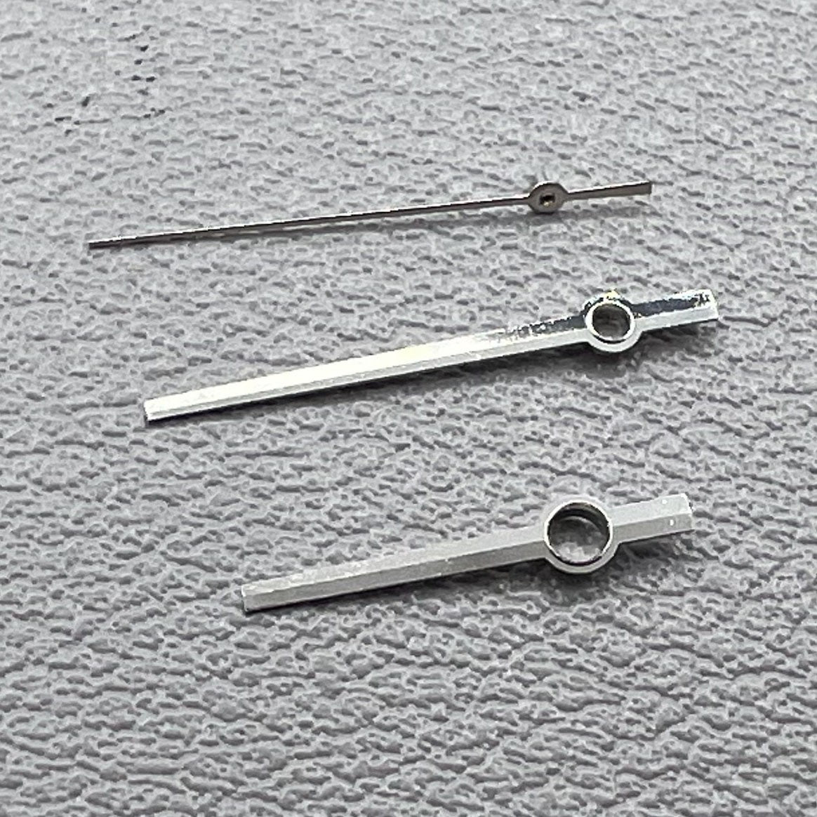1. Two sets of Modified Dayjust High Canon silver hands for Miyota 8285 watch movement.  