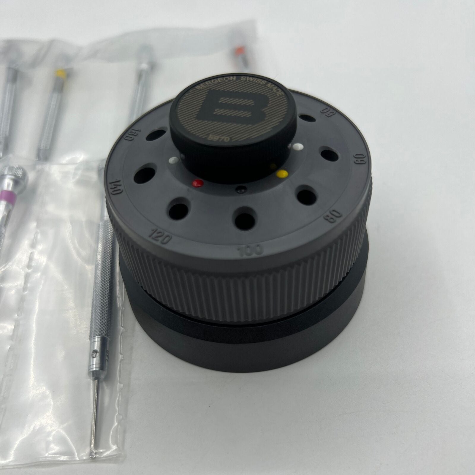 Bergeon 5970 rotating toolset with 9 precision screwdrivers for detailed watch repair, Swiss craftsmanship.