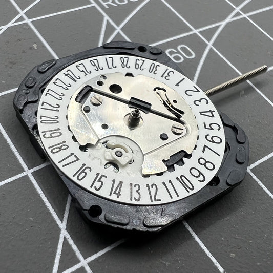 VX22 quartz watch movement with white date disk at 3 o'clock, Japan-made precision replacement by Seiko.