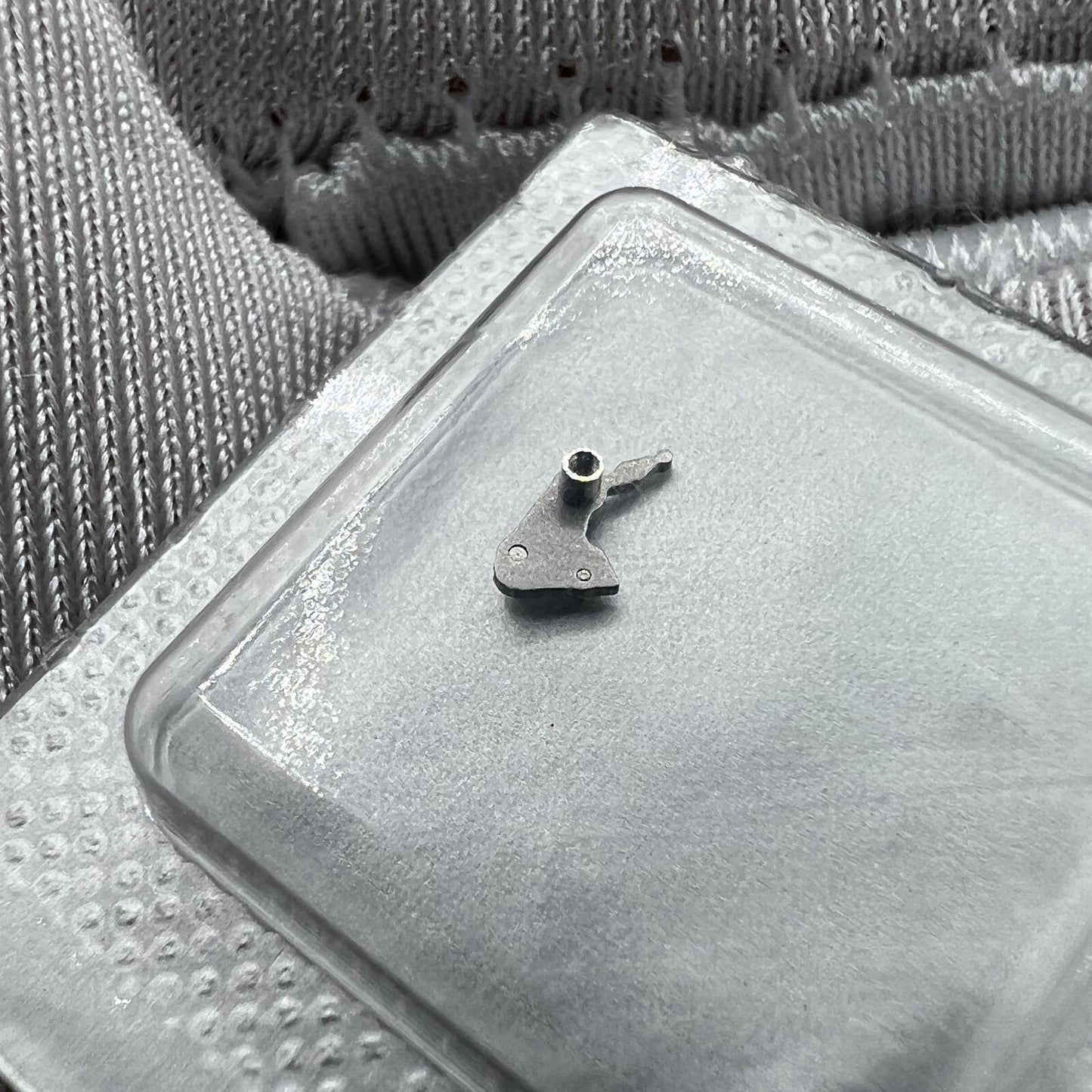 Swiss Made Omega 3303 3313 watch setting lever, precision-crafted for smooth, accurate movement operation.