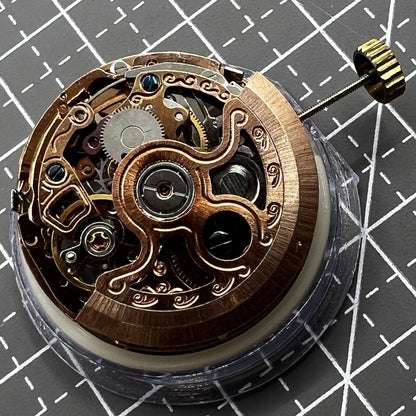 Hollow rose gold watch with mechanical movement, 4-eye dial, and 7 hands for precise timekeeping.