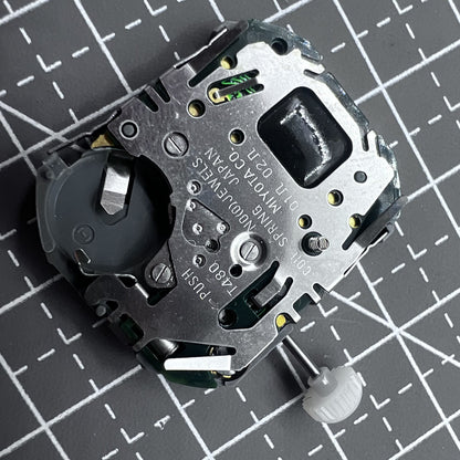 Japan Miyota T480 quartz movement watch mechanism with 3 hands and display screen for precise timekeeping.
