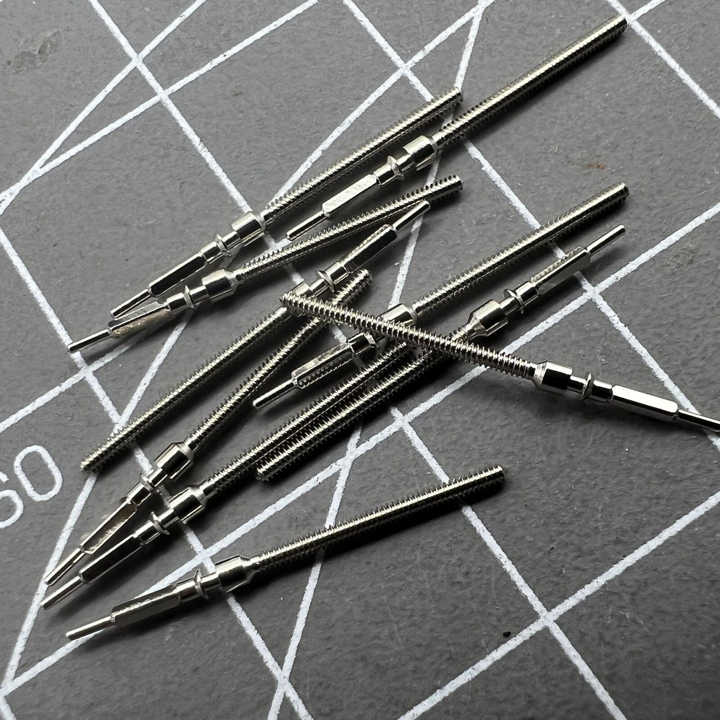 Generic watch winding stem for Shanghai 7120 movement, compatible with various watch models.