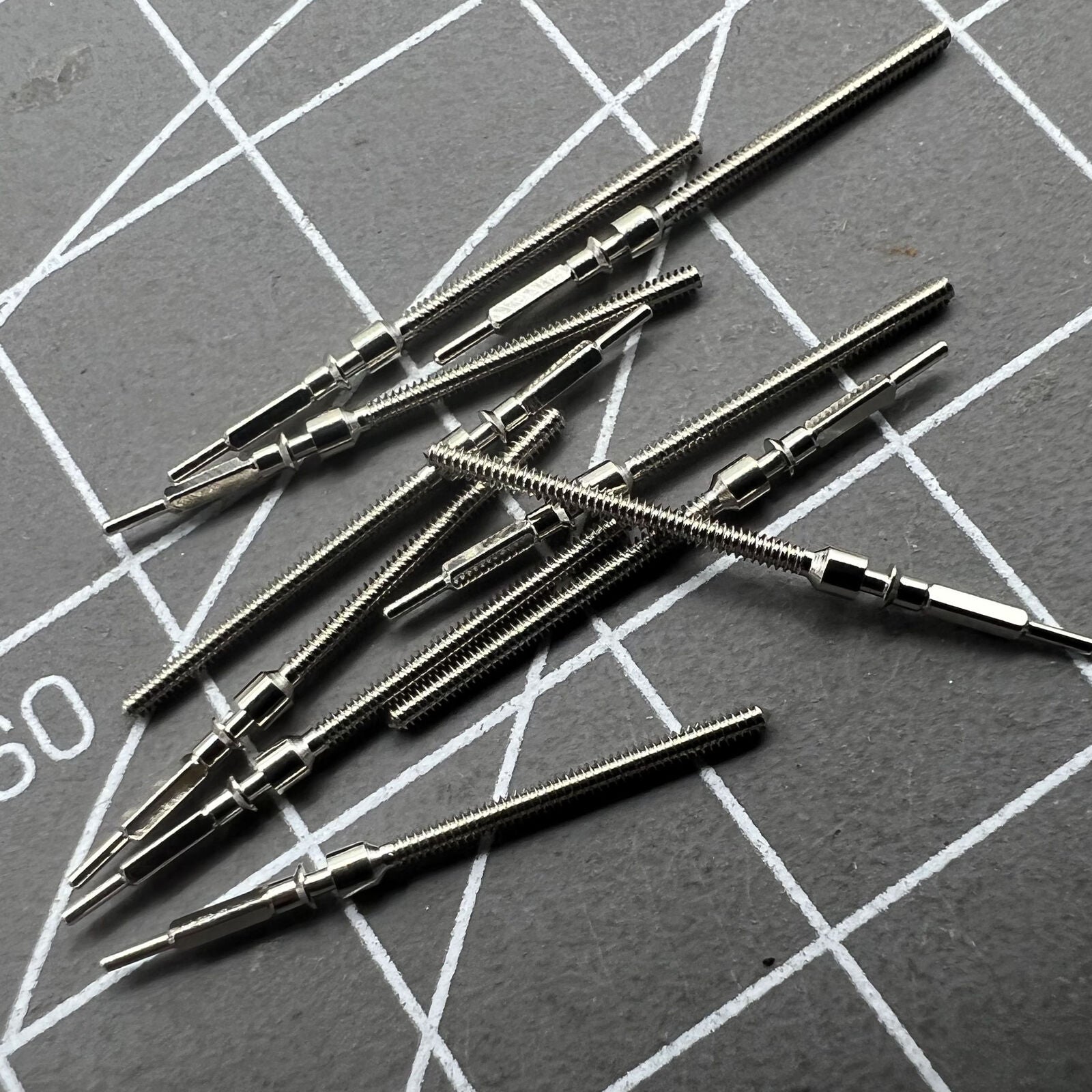 Generic watch winding stem for Shanghai 7120 movement, compatible with various watch models.
