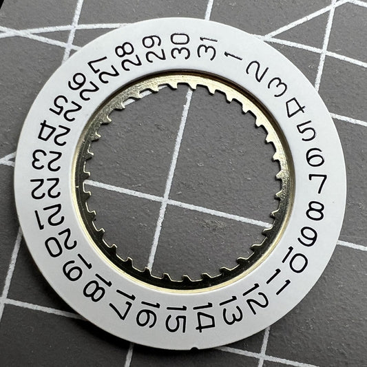 White date disk wheel for Ronda 5040D and 5030D watch movements, date at 4 o'clock position.