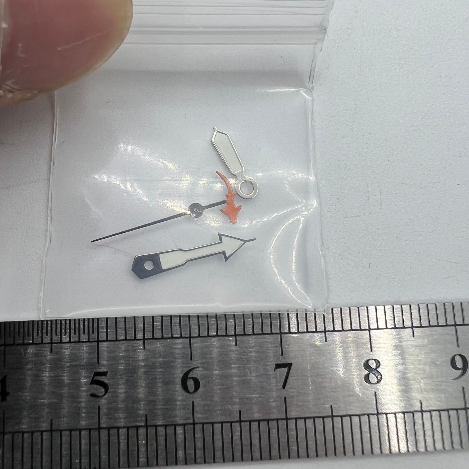 Fish-style second hand for NH35/NH36/4R36 watch movements, sleek and precise accessory.