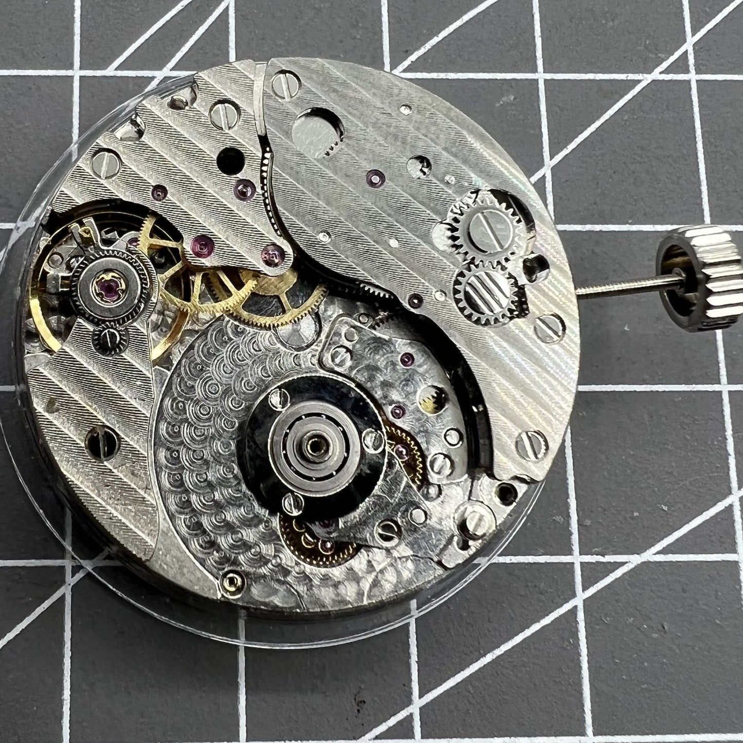 Hangzhou automatic kinetic watch with small second at 4, Chinese craftsmanship highlighting precise movement and no rotor.