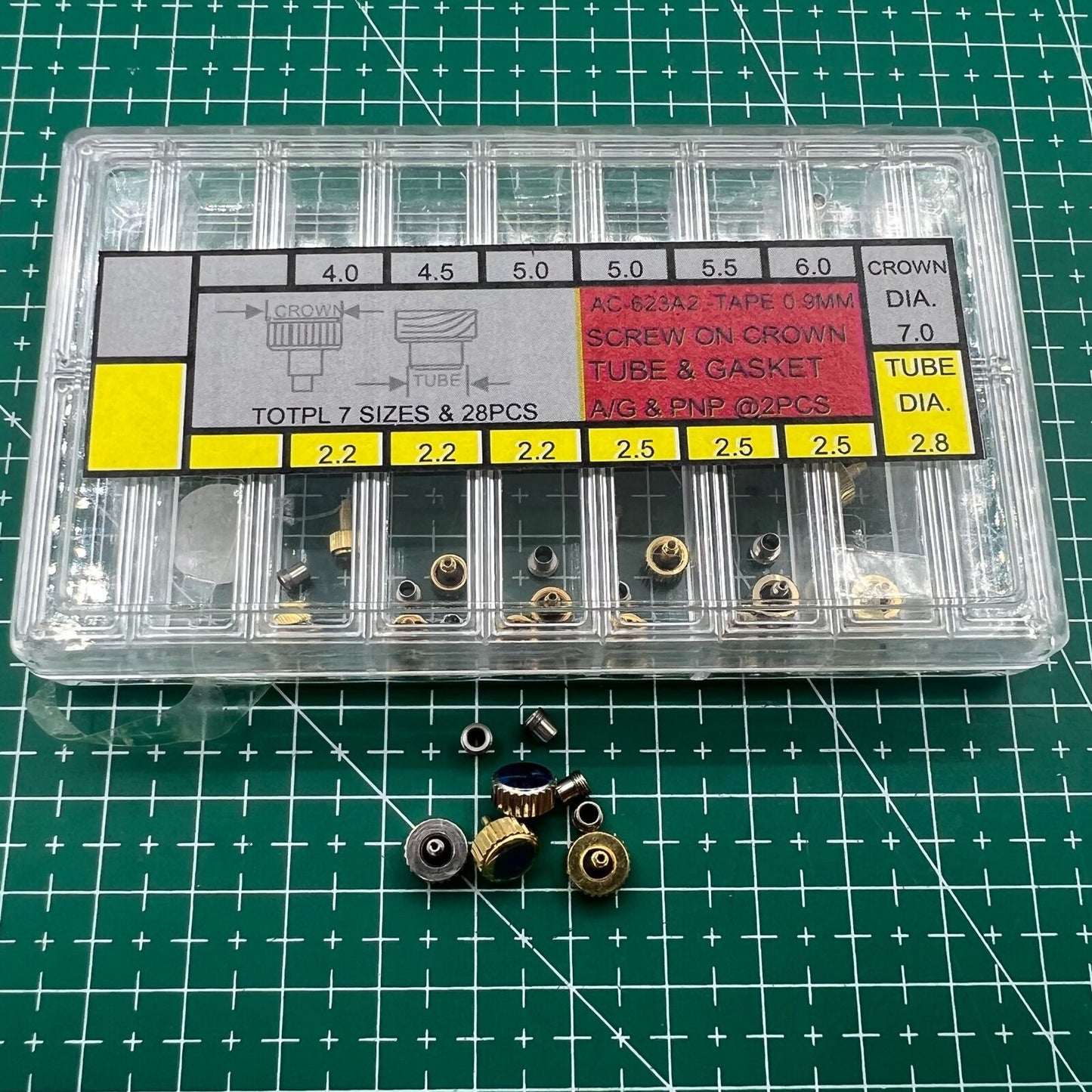 Wholesale stainless steel watch crown with silver and golden finish, screw-on tube and gasket, durable brand accessory.