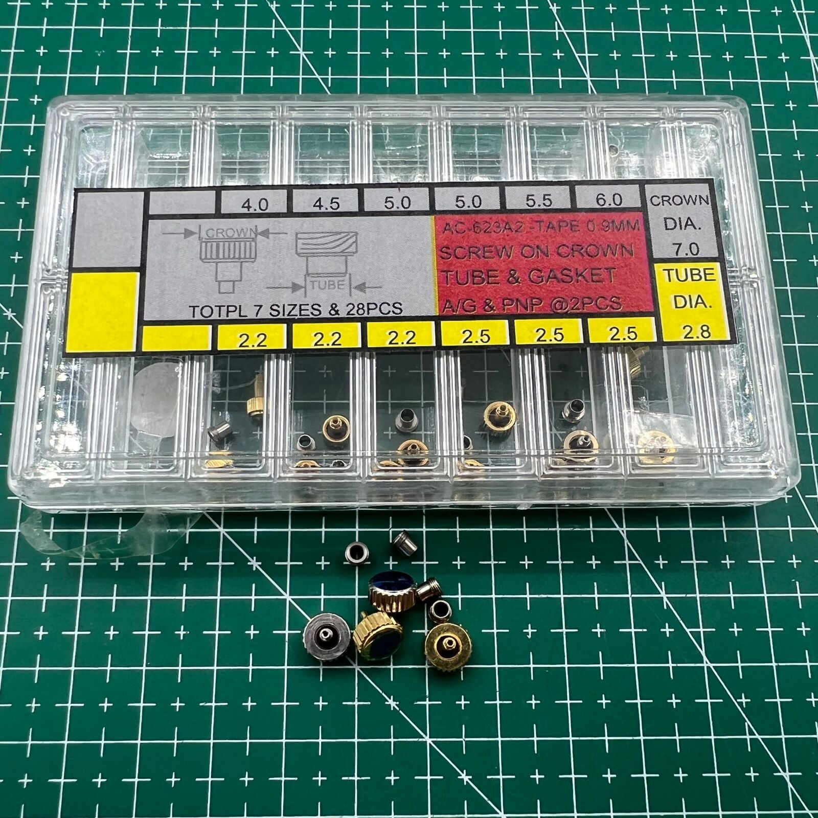 Wholesale stainless steel watch crown with silver and golden finish, screw-on tube and gasket, durable brand accessory.