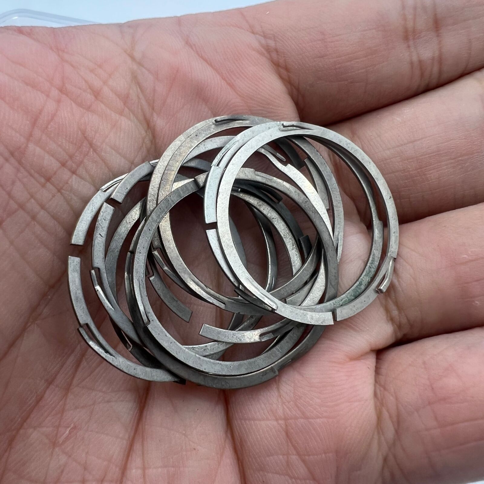 Steel watch case cushion mount spacer ring for China Made 7120 movement, durable watch accessory.
