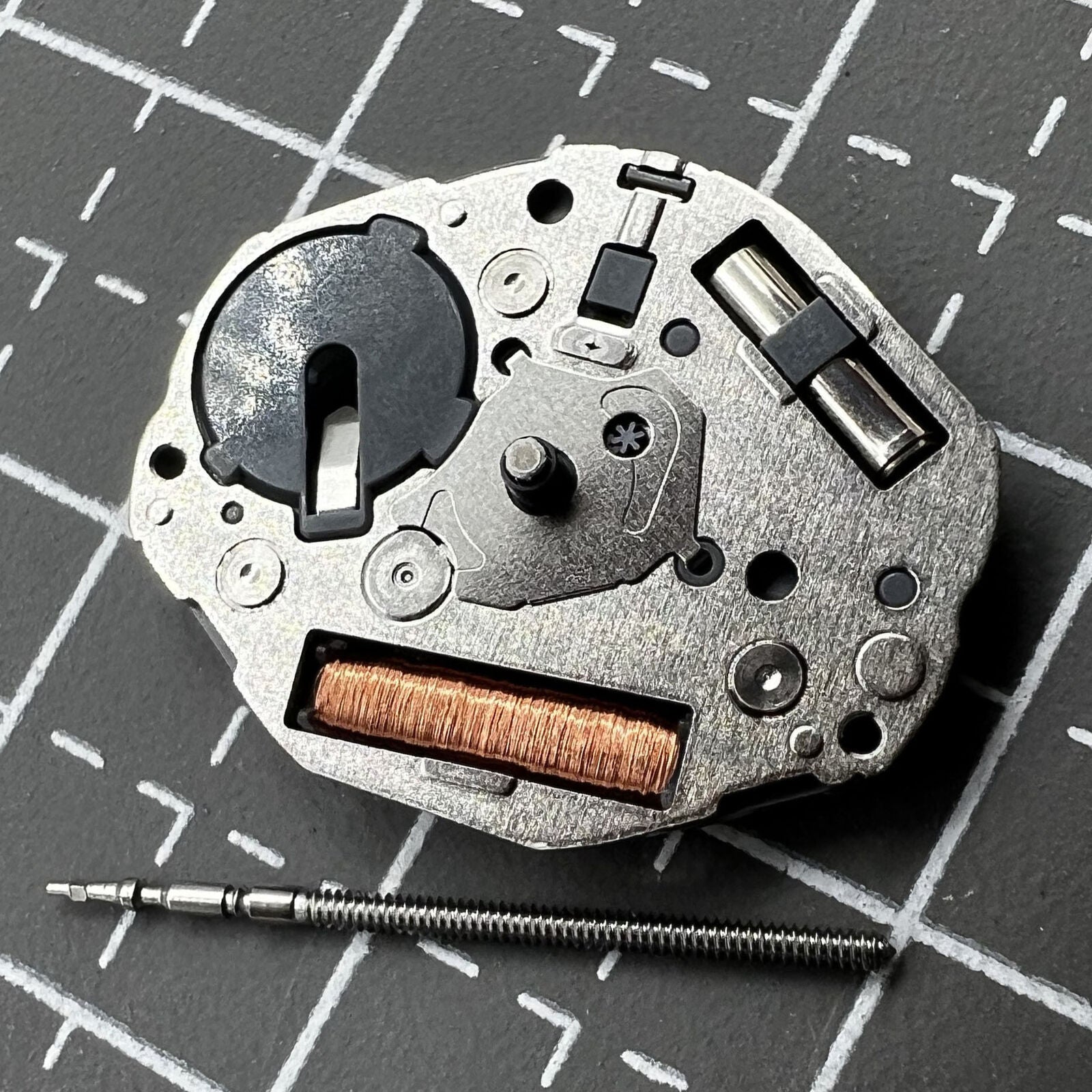 Miyota GL24 silver quartz movement with 2 hands, precise timekeeping for watch accessories.