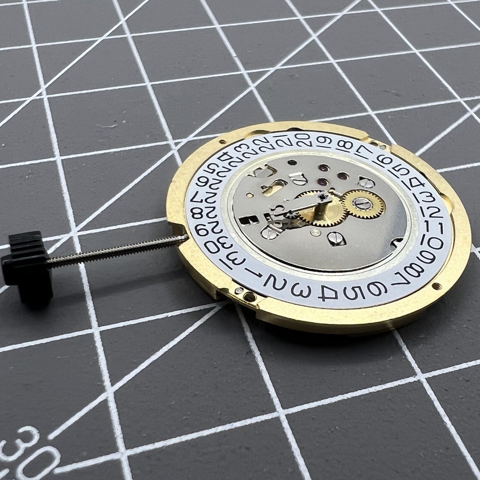 Swiss Made Ronda 1005 Slimtech quartz watch movement for slim, precise watch repairs and replacements.