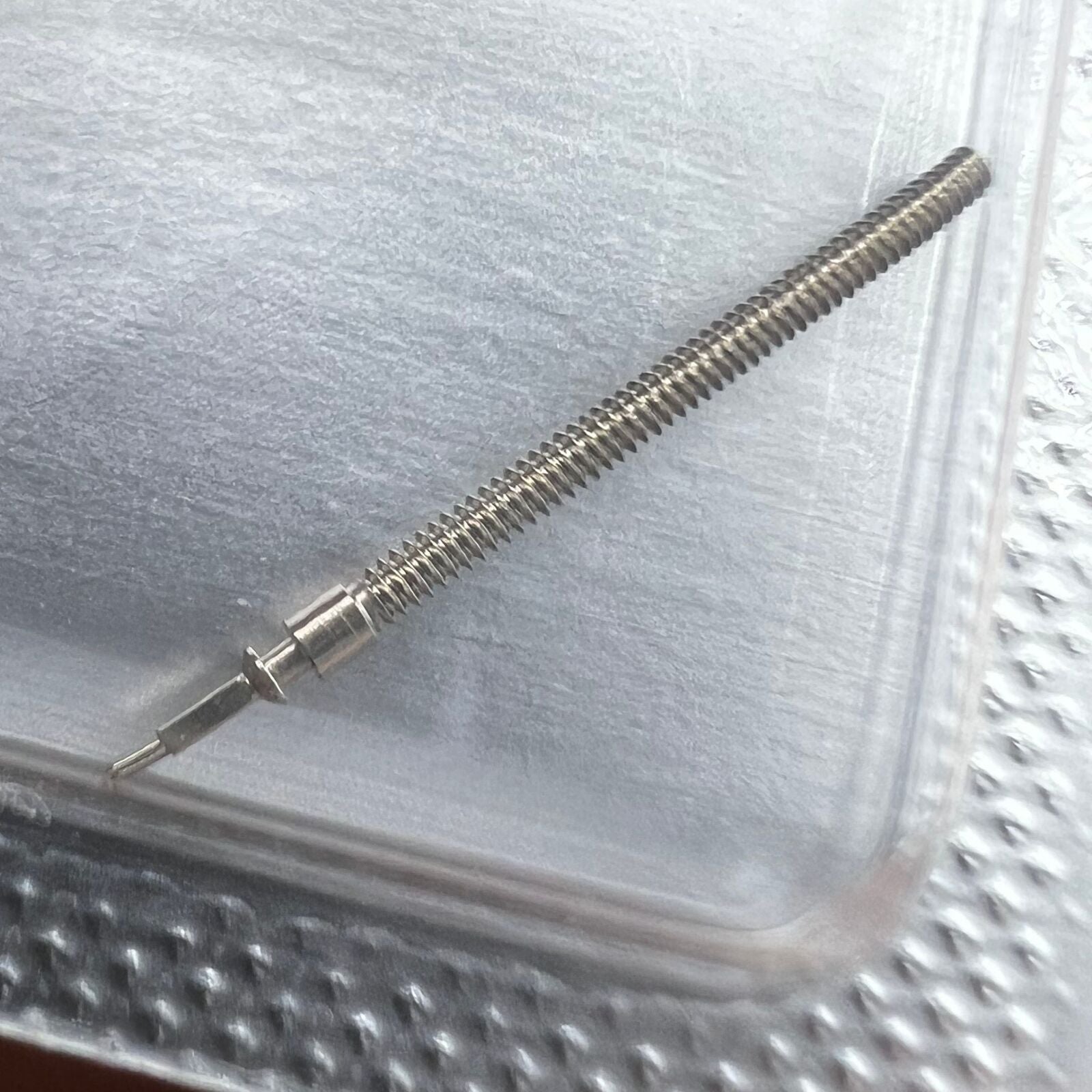 Generic watch winding stem compatible with ETA 901.001 & 901.005, precise fit for smooth winding.