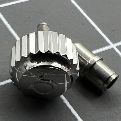 Polished 6.3mm silver OMEGA Seamaster 300 watch crown with tube, precise replacement accessory.