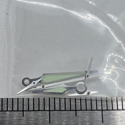 Silver trim luminous watch hands by ETA for G10.211 quartz movement, enhancing readability and style.
