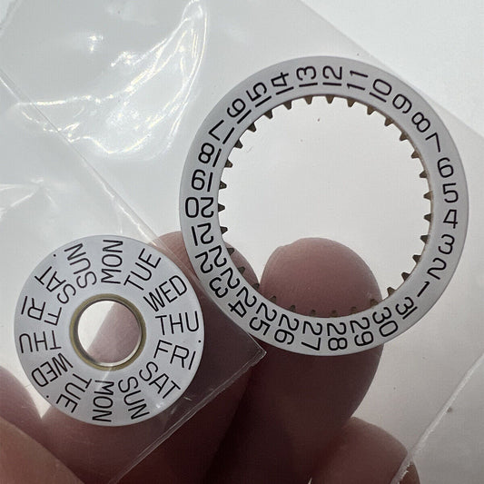 White date disk wheel showing date numbers, genuine ETA7750 movement part for watch repair.