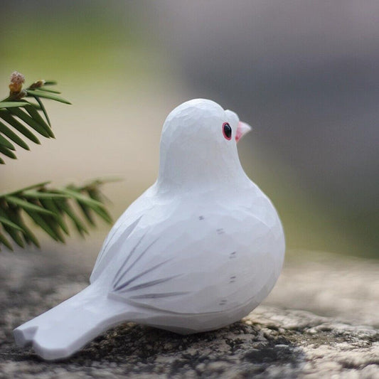 Handmade white carved peace dove wooden figurine sculpture, elegant decorative artwork for home or office.
