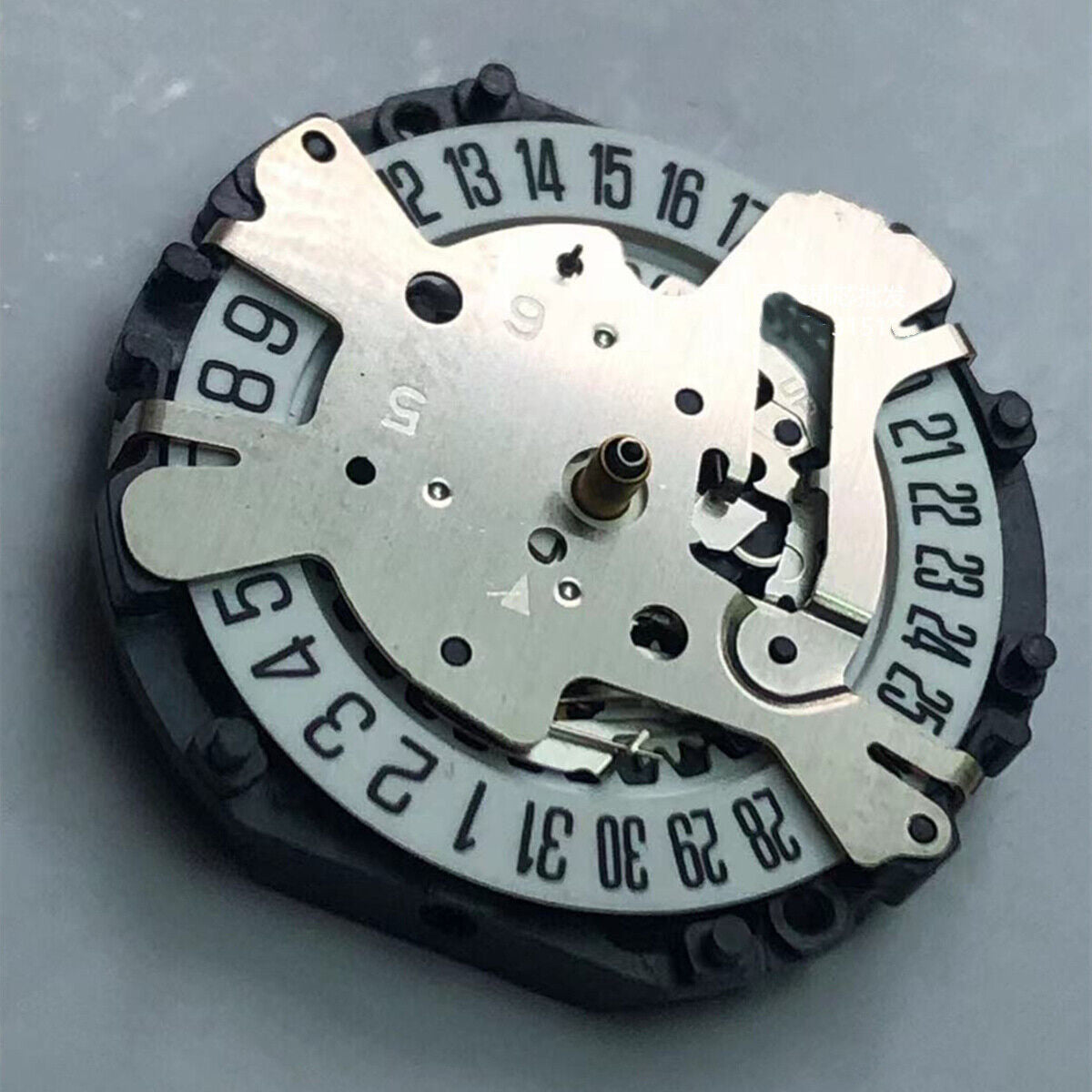 Hattori Epson VX16E quartz watch movement, Japan-made precision for reliable timekeeping.