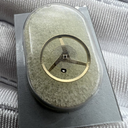 Balance wheel for ETA C01.211 movement by Swiss brand, precise timing component for watch repair.