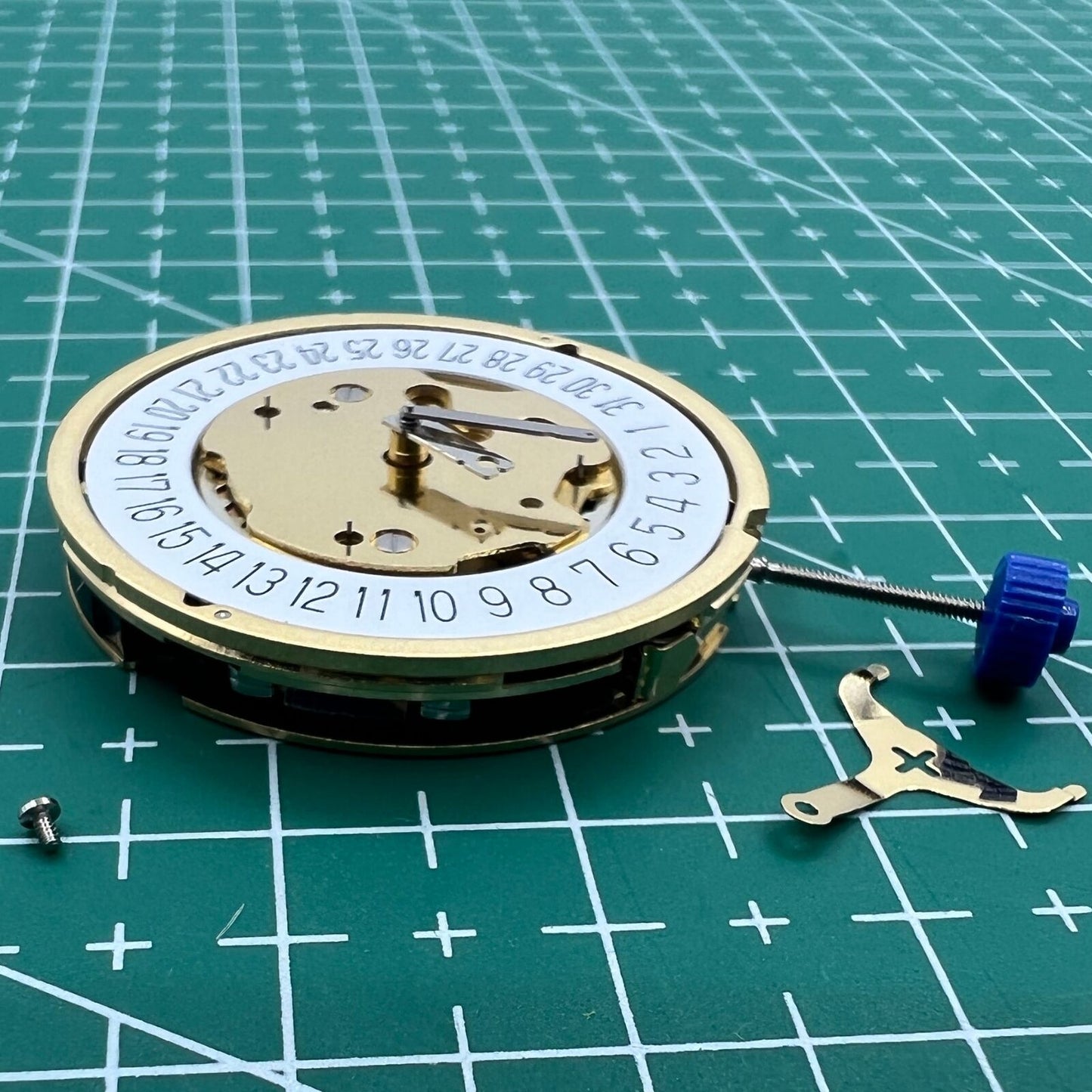 Swiss Made Ronda 5030D quartz watch movement with date display at 6 o'clock, perfect for watch repair.