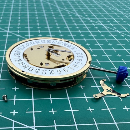 Swiss Made Ronda 5030D quartz watch movement with date display at 6 o'clock, perfect for watch repair.