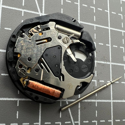 Hattori Epson TMI VX12 quartz watch movement with date display at 3 o?clock, precision Japan-made parts.