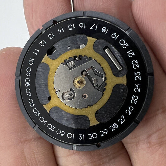 Watchmakers ISA 2334 black dial quartz movement for precise timekeeping, compatible replacement part
