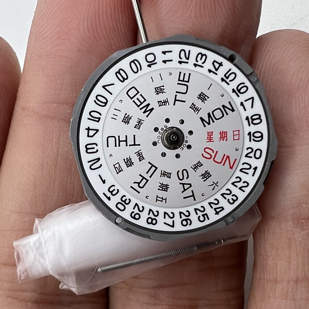 Miyota 1M02 quartz watch movement showing 3 hands with date and day display at 3 o'clock.