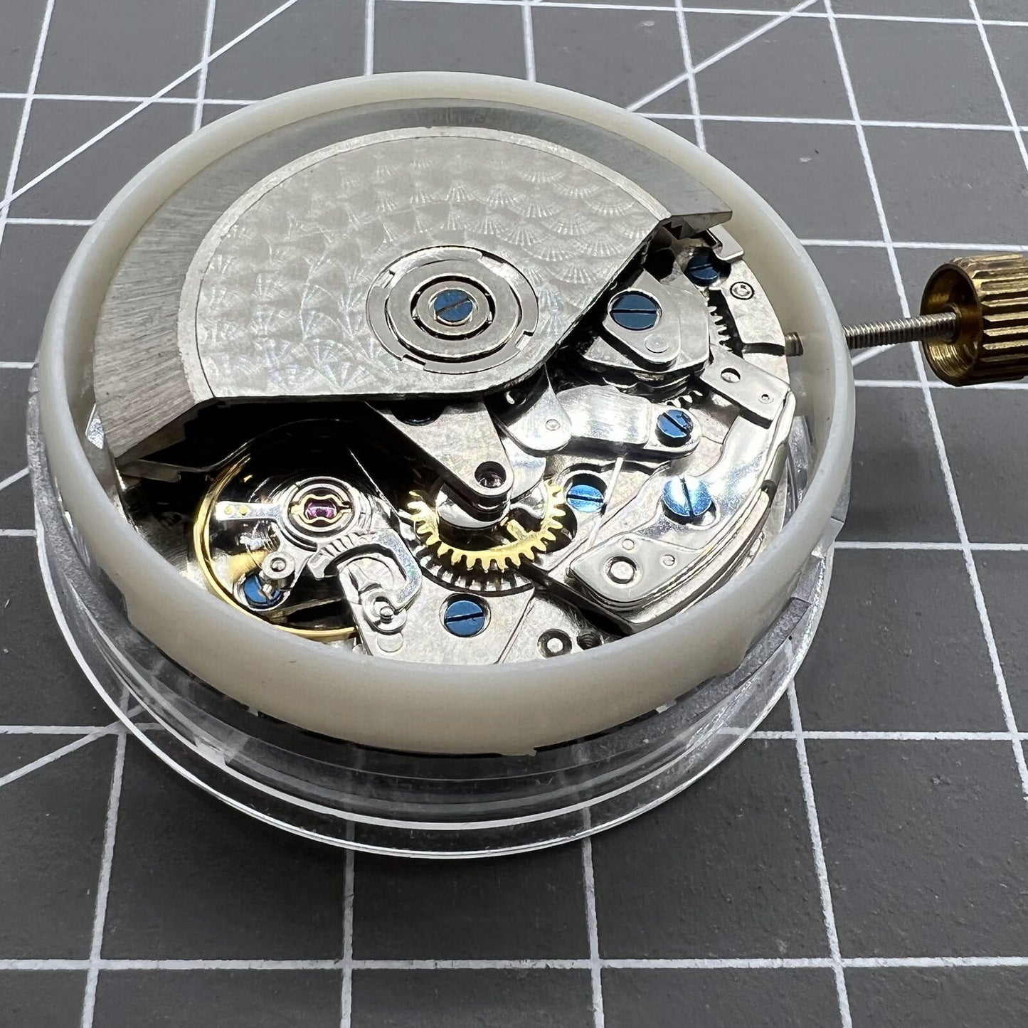 Asia Made 7750 mechanical watch movement with black dial, single calendar, and three small second subdials at 3, 6, and 9 o'clock positions.