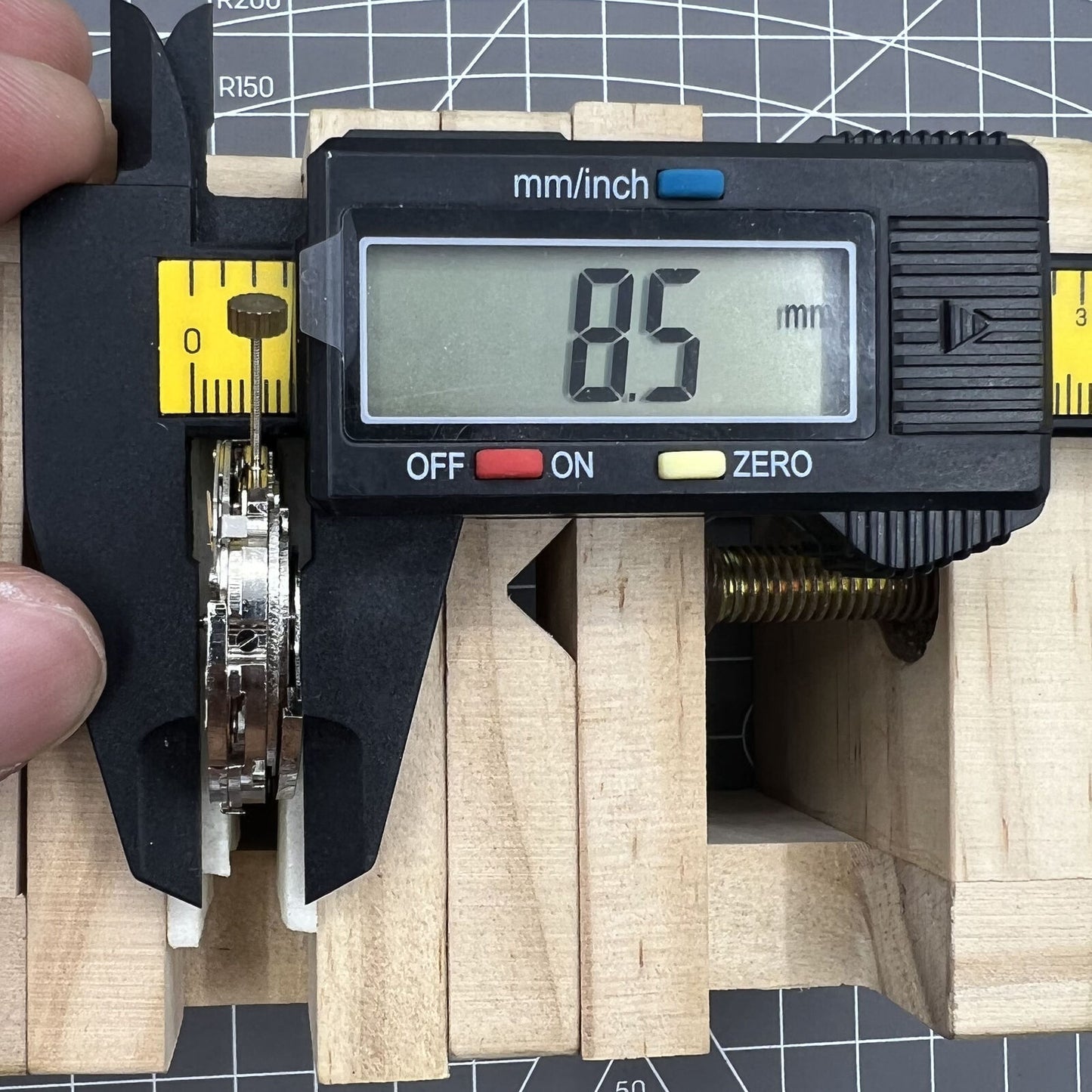 Automatic mechanical watch featuring reversed balance wheel and large date display at 12.