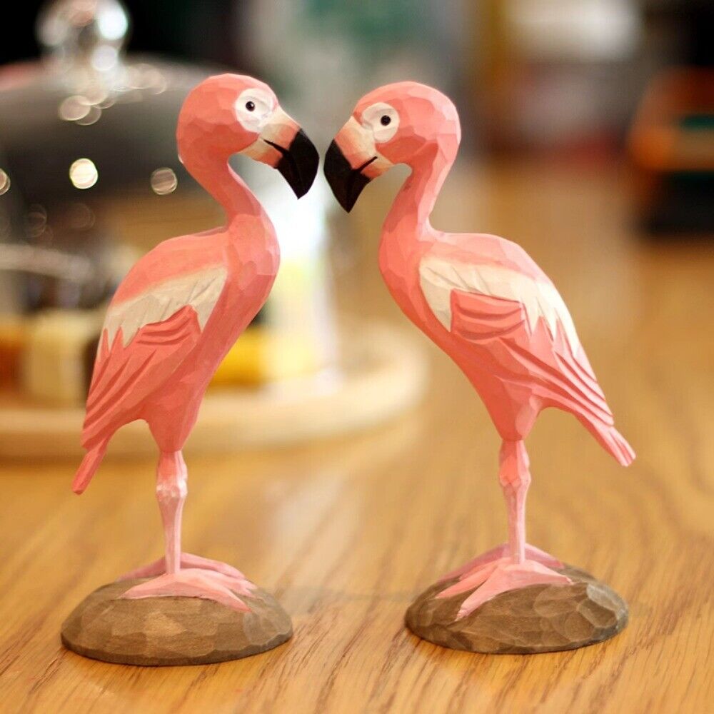 Handcrafted pink flamingo wooden figurine, vibrant decor for home or office spaces.