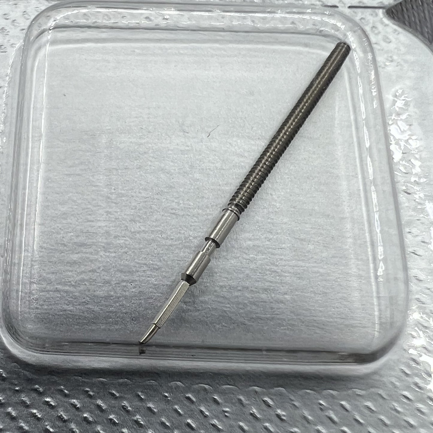 Watch winding stem for Swiss Made Ronda 1015 movement, precision-crafted for reliable timekeeping.