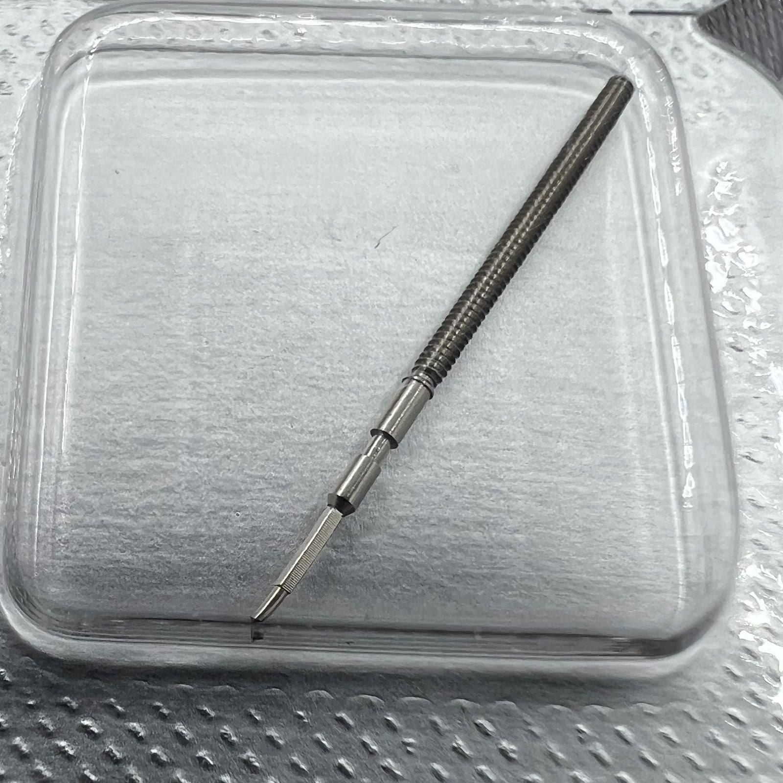 Watch winding stem for Swiss Made Ronda 1015 movement, precision-crafted for reliable timekeeping.