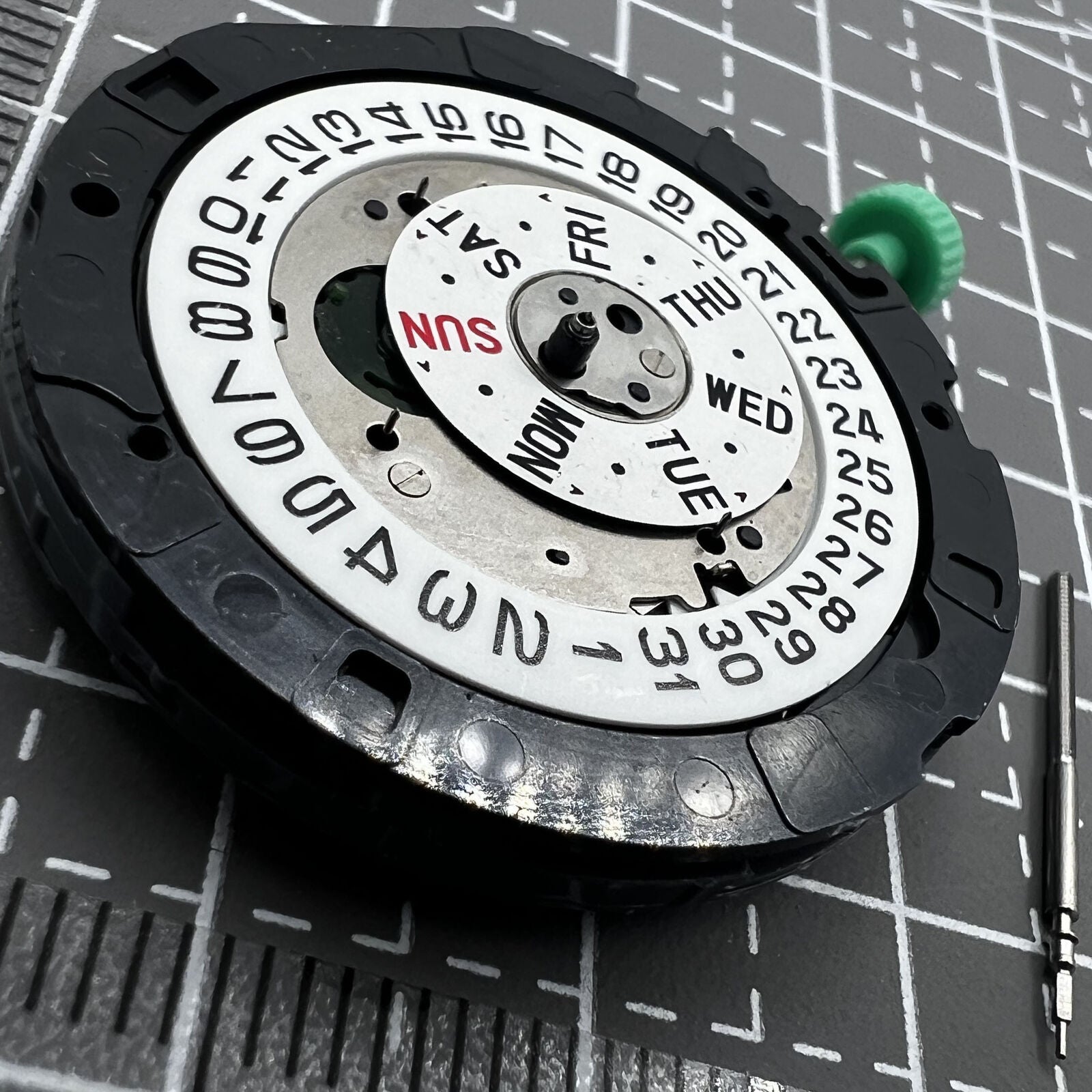 Miyota OS00 Quartz watch displaying multifunctional date and single calendar at 3 o'clock slot