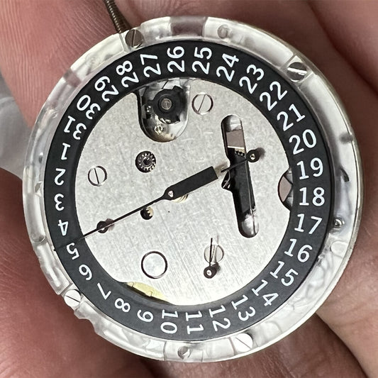 Swiss Made ETA C01.211 chronograph watch movement with black dial, mechanical precision by 1853.