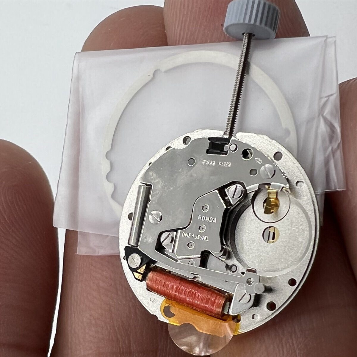 Swiss RONDA 785 golden calendar quartz watch movement by Original Swiss for accurate timekeeping.