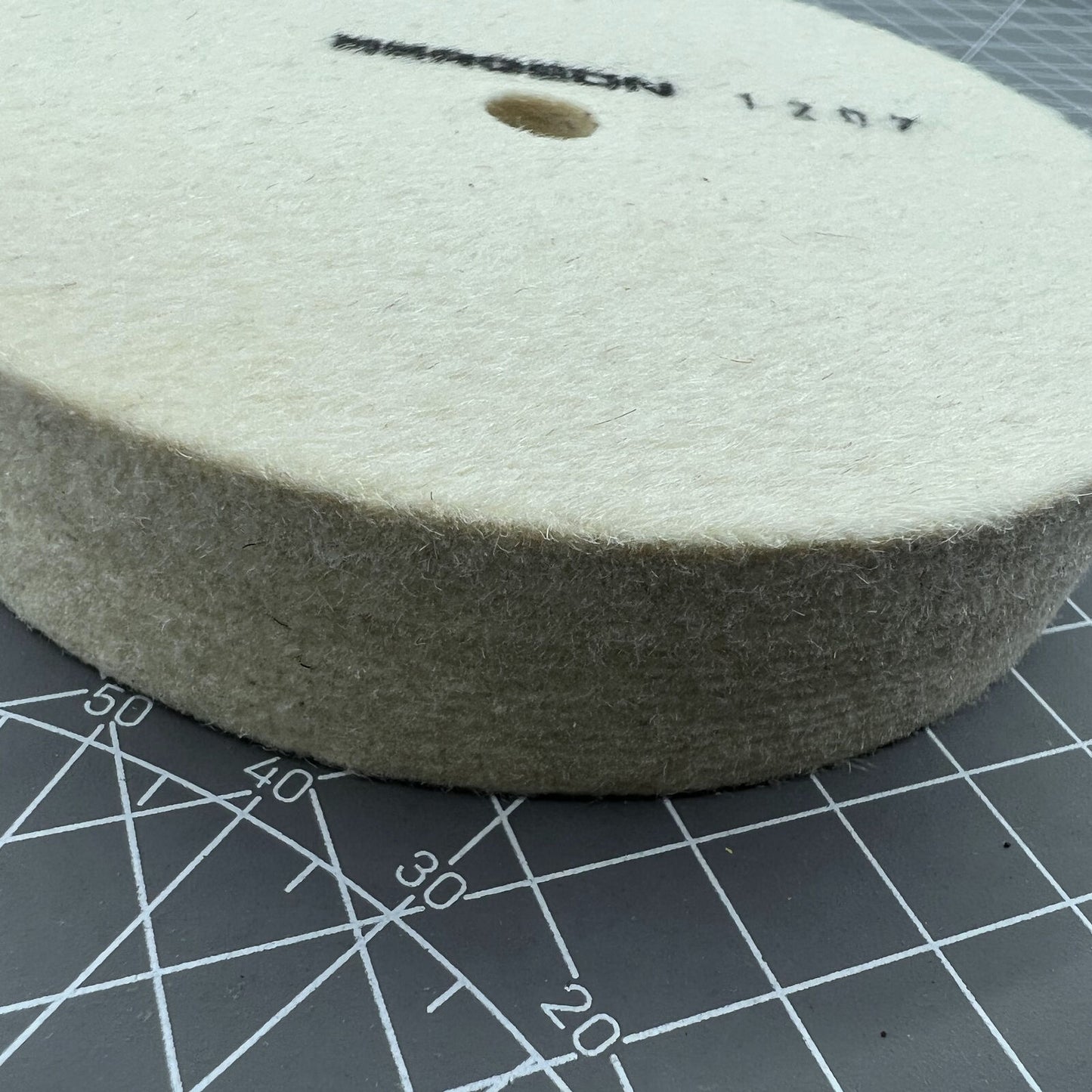 Swiss Bergeon 1207 white felt polishing wheels for watch accessories, precision Swiss quality finishing tool.