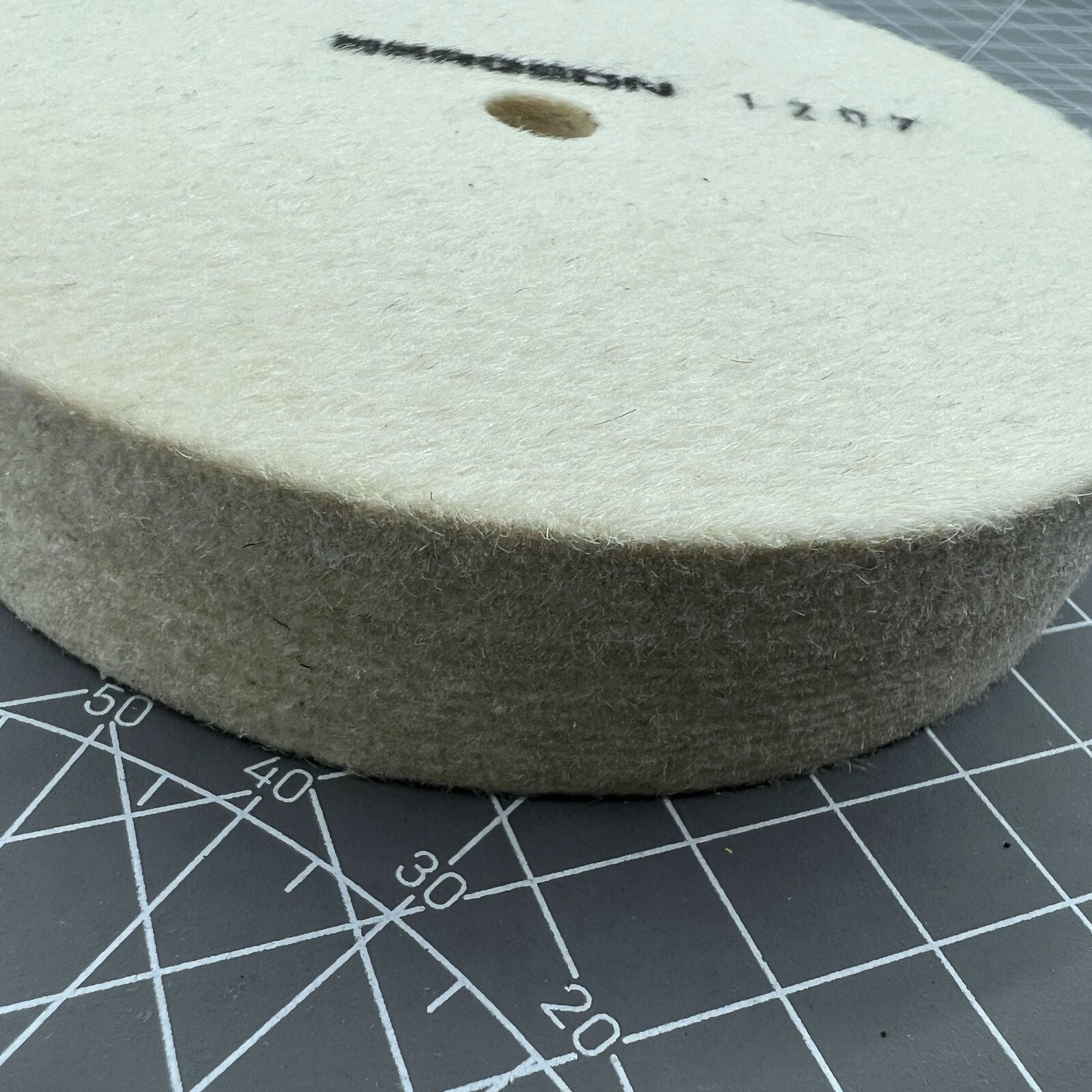 Swiss Bergeon 1207 white felt polishing wheels for watch accessories, precision Swiss quality finishing tool.