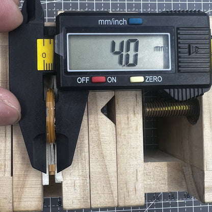 Japan Miyota GM10 watch movement with date display at 6 o'clock, precise quartz mechanism.