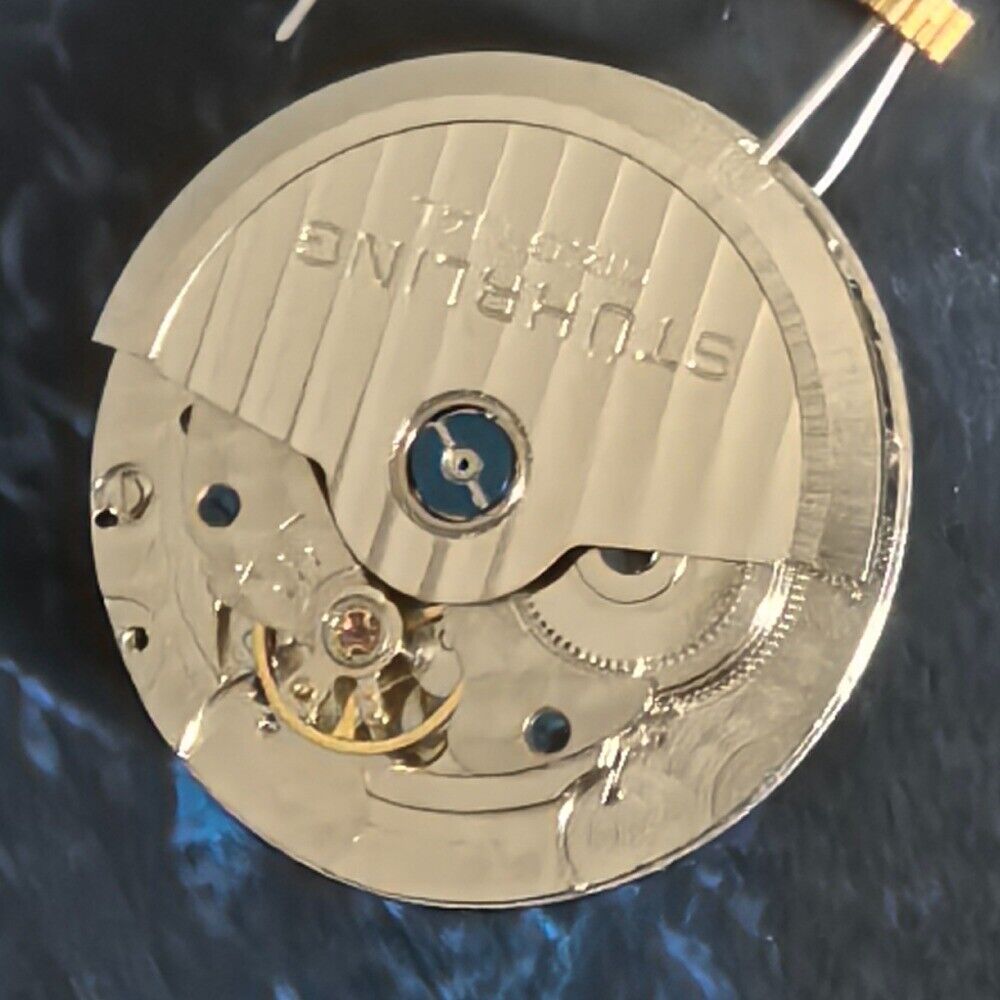 Silver mechanical watch gear for big date single calendar, precision movement part for China-made watches.