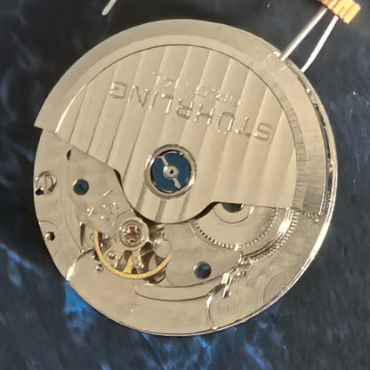 Silver mechanical watch gear for big date single calendar, precision movement part for China-made watches.