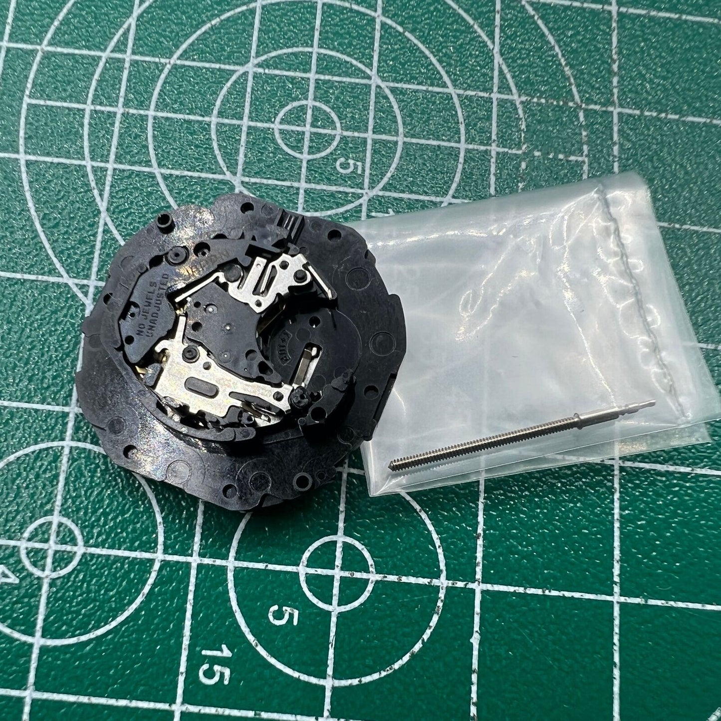 Hattori Epson TMI PC39 quartz watch movement, Japan-made, precise timekeeping for repair or custom watches.